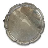 A LARGE VICTORIAN SILVER SALVER Having a scalloped beaded edge with pierced design and engraved