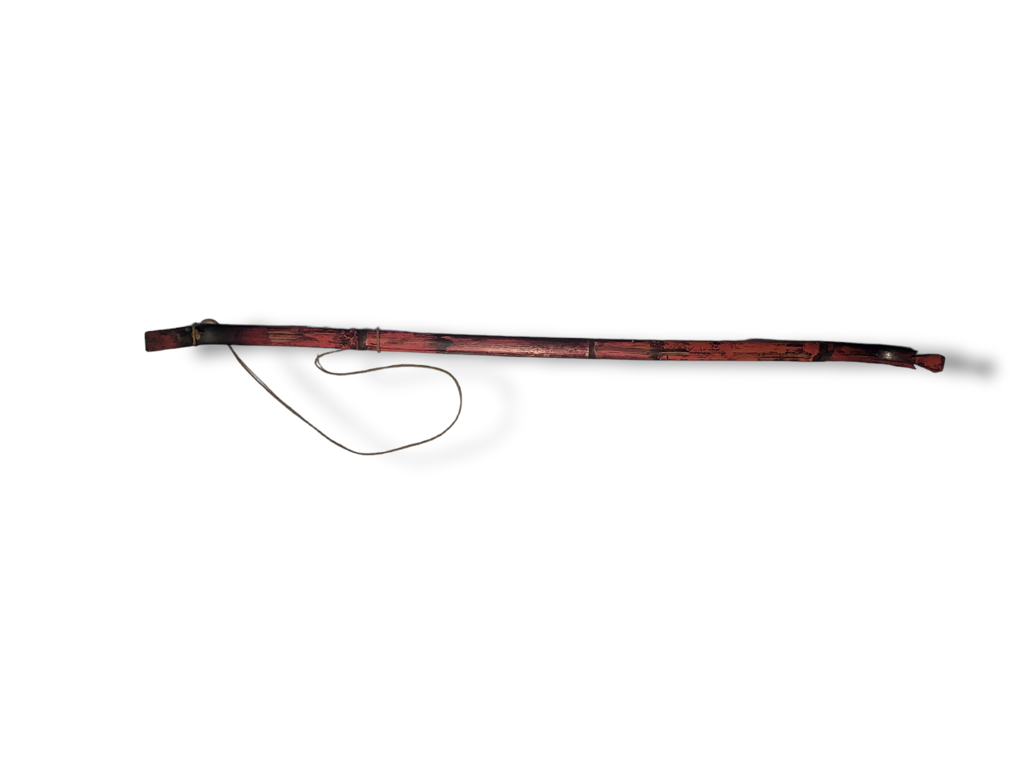 AN ANTIQUE NATIVE AMERICAN INDIAN WOODEN BOW Of curved form with carved finials and red painted