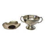 AN EARLY 20TH CENTURY SILVER TROPHY CUP Having twin handles and Celtic form decoration, engraved