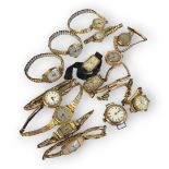 A COLLECTION FIVE VINTAGE 9CT GOLD LADIES’ WRISTWATCHES Comprising Tudor, Tissot and Marvin, on gold