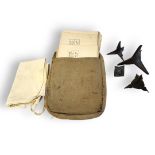 FOUR WWII STEEL CALTROPS along with seven maps of the Sundarbans, in canvas bag. (largest 10cm)
