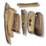 A COLLECTION OF SEVEN ANTIQUE NATIVE AMERICAN INDIAN BONE CARVINGS/TOOLS To include three carved