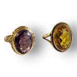 TWO VINTAGE YELLOW METAL AND GEM RINGS Set with oval cut amethyst and citrine stones. (size N/O)