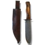 WILKINSON SWORD, A WWII RAF SURVIVAL/FIGHTING KNIFE The heavy gauge steel blade stamped with the