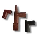 A COLLECTION OF THREE ANTIQUE NATIVE AMERICAN INDIAN STONE PEACE PIPES Two carved from red
