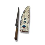 A LATE 19TH/EARLY 20TH CENTURY NORTH AMERICAN INDIAN KNIFE IN BEADED SCABBARD. (33cm) Condition: