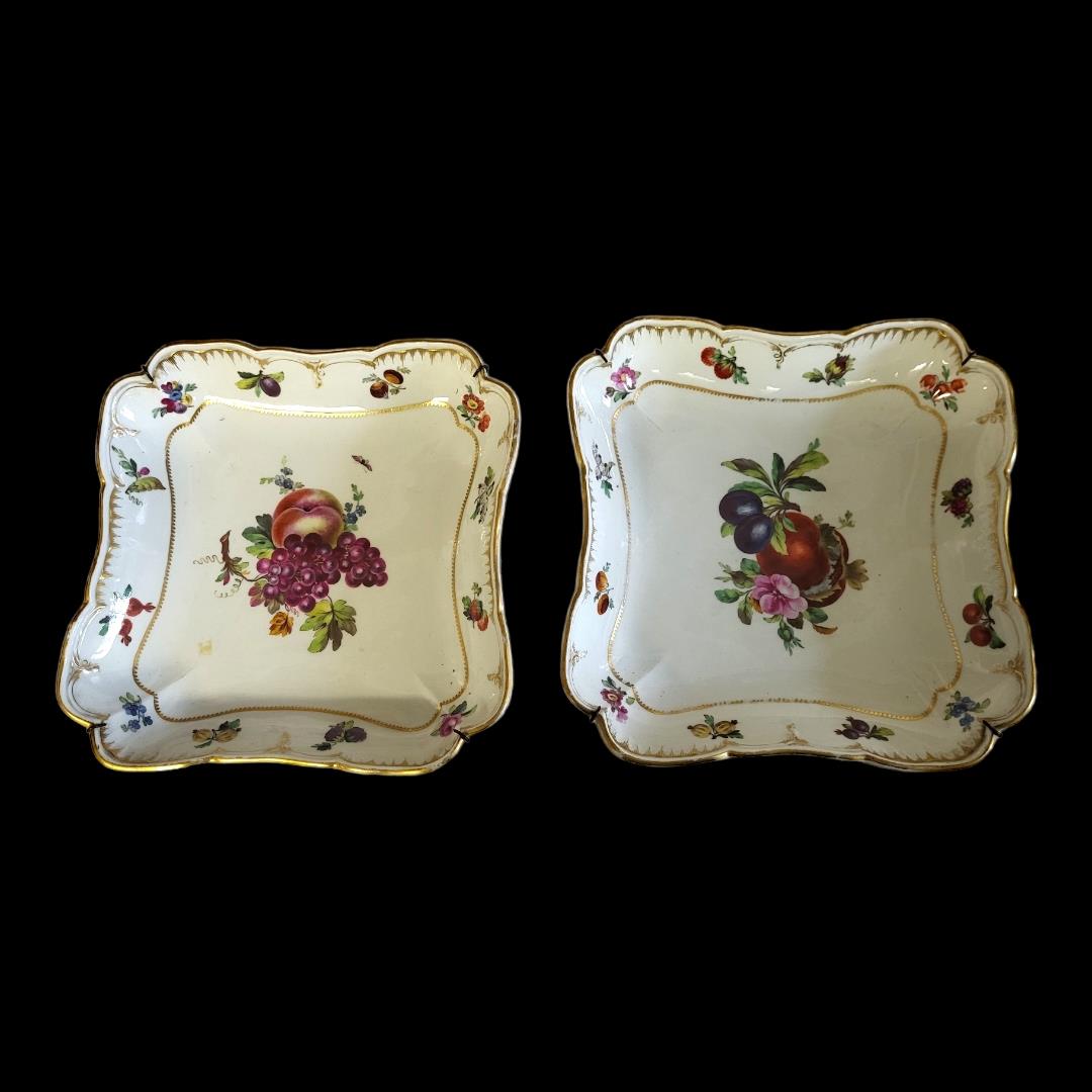 A PAIR OF 19TH CENTURY KPM BERLIN HARD PASTE PORCELAIN SQUARE DESSERT PLATES Decorated with summer