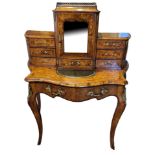 A HIGH VICTORIAN WALNUT AND FLORAL MARQUETRY INLAID LADIES WRITING TABLE, with pierced brass gallery