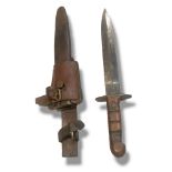 A WWII AMERICAN TRENCH KNIFE in steel and leather scabbard, stamped M & Co. (30cm) Condition: