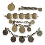 A COLLECTION OF SILVER AND WHITE METAL COIN SET BRACELETS To include a five Portuguese 10 Escudos