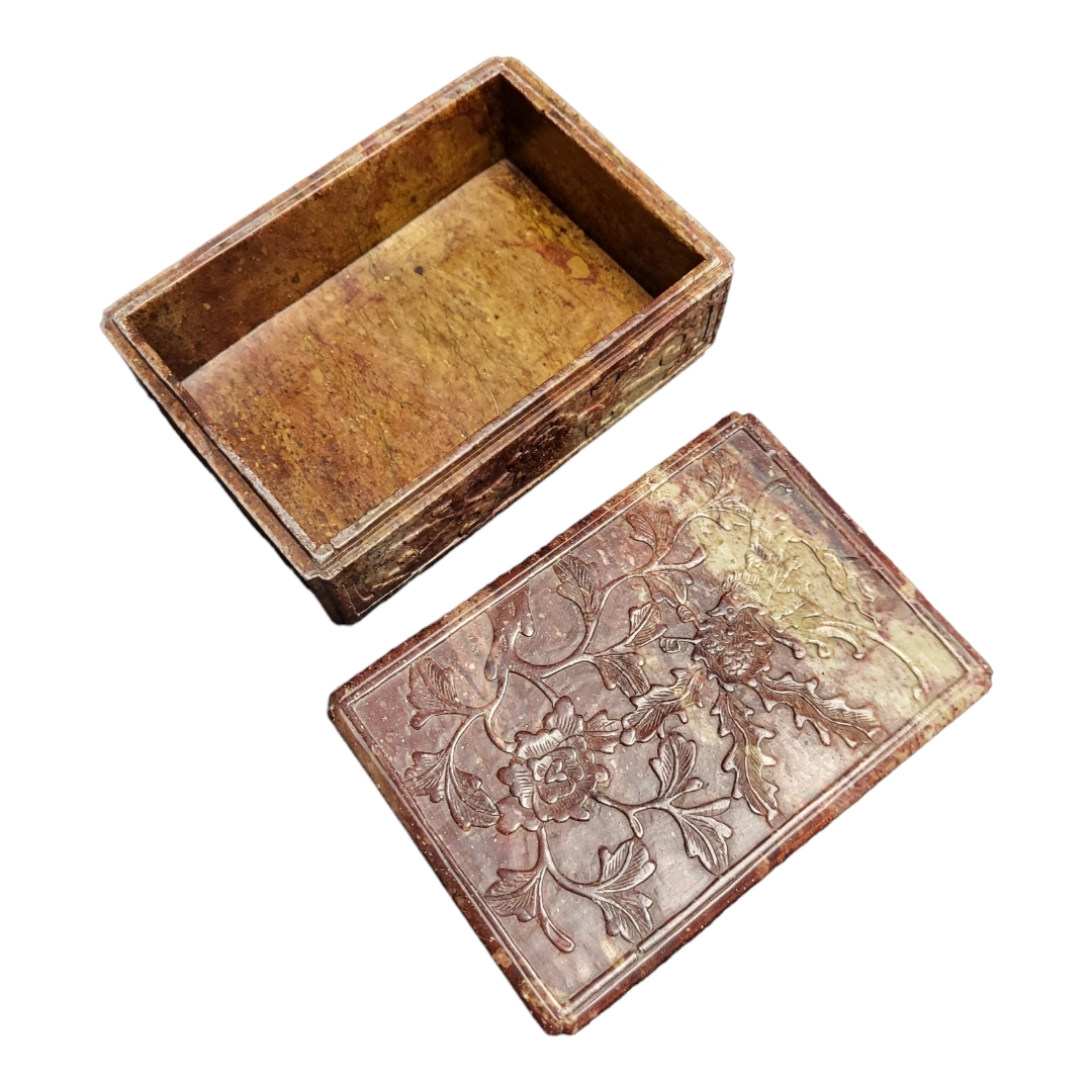 AN EARLY 20TH CENTURY CHINESE SOAPSTONE RECTANGULAR CIGARETTE BOX With carved floral decoration. ( - Image 2 of 2