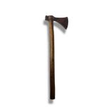 AN ANTIQUE NATIVE AMERICAN INDIAN IRON AND WOOD TOMAHAWK Having a triangular form iron axe head with