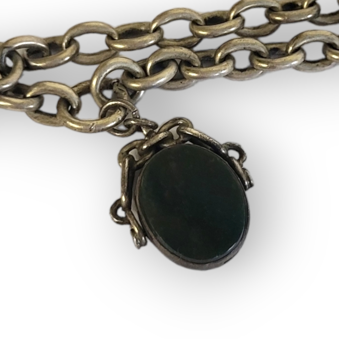 A VICTORIAN SILVER ALBERT CHAIN Having uniform pierced links and hardstone swivel fob. (approx 37cm) - Image 2 of 2