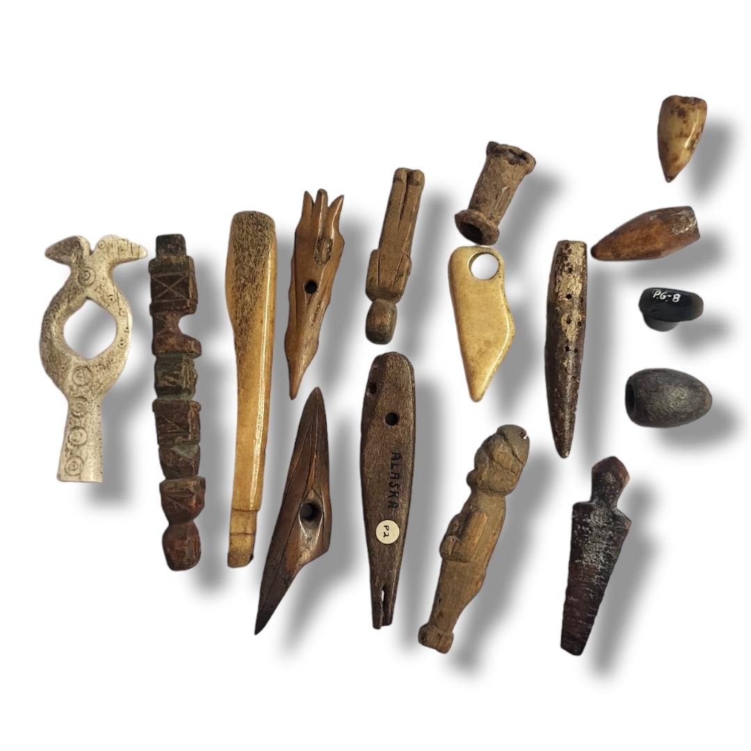 A COLLECTION OF ANTIQUE NATIVE AMERICAN INDIAN BONE AND WOOD CARVINGS To include a fishing lure - Image 2 of 2