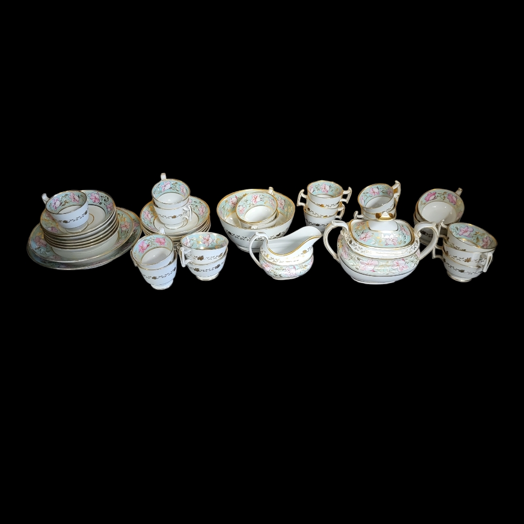 ATTRIBUTED TO EARLY STAFFORDSHIRE, AN EARLY 19TH CENTURY ENGLISH PORCELAIN TEA SERVICE, CIRCA 1805 -