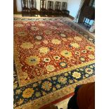 A LARGE AND IMPRESSIVE HAND MADE INDIAN ZIEGLER CARPET ARAK DESIGN, ON RED AND BLUE GROUND. (531cm x