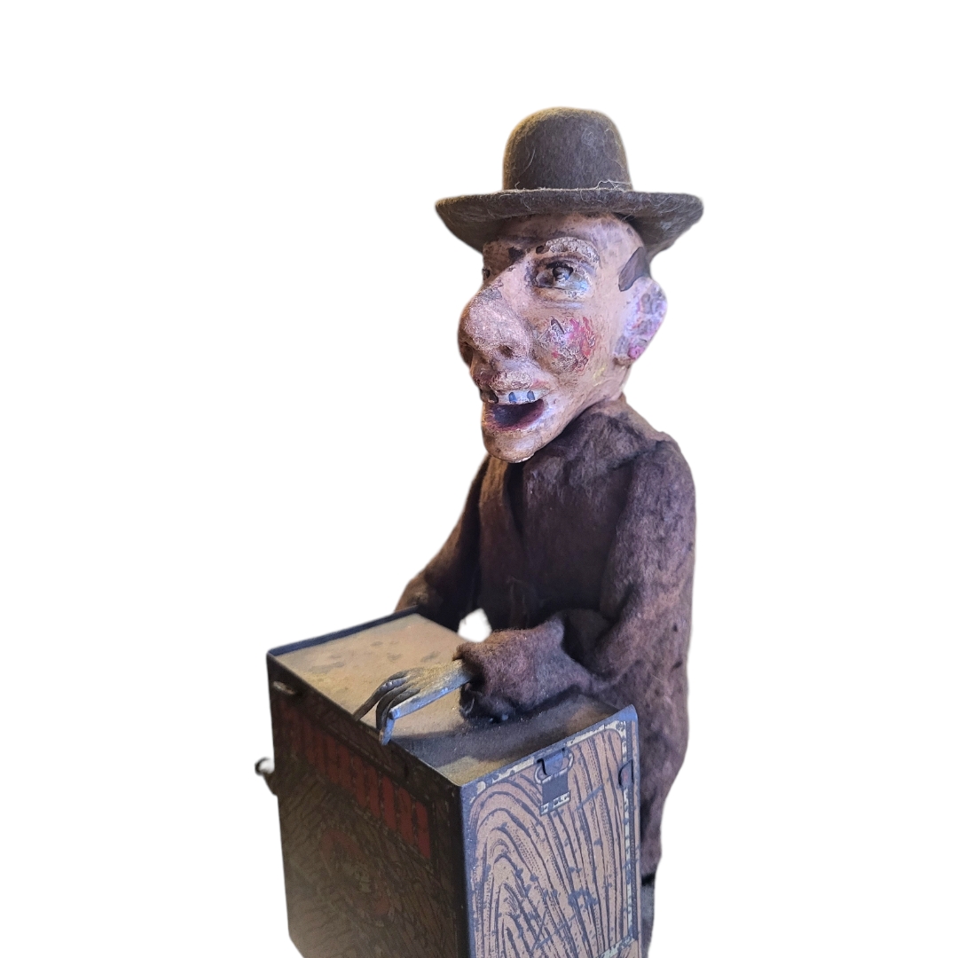 A LATE 19TH/EARLY 20TH CENTURY CONTINENTAL WIND UP TIN TOY OF GROTESQUE BARREL ORGAN PLAYER Possibly - Image 2 of 5