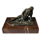 A LATE 19TH/EARLY 20TH CENTURY BRONZE FIGURE OF A FALLEN SOLDIER Holding a flag with broken sword