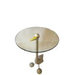 ALESSANDRO MENDINI, A CAST ALUMINIUM OCCASIONAL TABLE FORMED AS A DUCK With circular glass top,