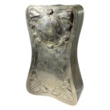 ARTS AND CRAFTS, A PEWTER CLOCK CASE, ENGRAVED WITH FLOWERS AND BUTTERFLIES. (h 24.6cm x w 14.5cm