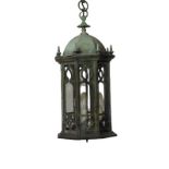 A GOTHIC REVIVAL VERDIGRIS CAST BRONZE HANGING HALL LANTERN. (h 72.5cm x diameter 26cm)