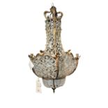 A LARGE MID 19TH CENTURY FRENCH BRONZE AND GLASS BASKET CHANDELIER Decorated with scrolling