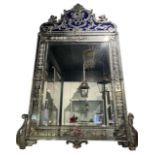 A LARGE DECORATIVE 19TH CENTURY VENETIAN BLUE AND ETCHED CLEAR GLASS MIRROR With scrolling