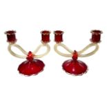POSSIBLY MURANO, A PAIR OF 20TH CENTURY VENETIAN GLASS CANDELABRAS Having red glass base and