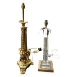 TWO REGENCY DESIGN LAMPS To include a heavy polished brass, raised on a triform scrolling base and a