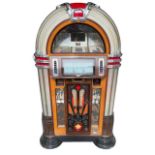 A STYLISH ART DECO DESIGN WALNUT LIMITED EDITION NOSTALGIA JUKEBOX. (h 151.5cm x d 64cm x w 90cm)