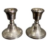 A PAIR OF VINTAGE SILVER CANDLESTICKS, HALLMARKED JP, BIRMINGHAM, 1967. (h 9cm x d 7.6cm, gross