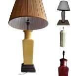 A COLLECTION OF FOUR CHINESE DESIGN PORCELAIN LAMPS IN THE FORM OF VASES One oxblood red and the