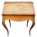 A 19TH CENTURY GILT METAL MOUNTED ROSEWOOD AND MARQUETRY LADIES’ WRITING BUREAU With gallery top