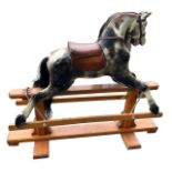 POSSIBLY COLLINSON OF LIVERPOOL, AN EARLY 20TH CENTURY CARVED WOOD DAPPLE GREY ROCKING HORSE With