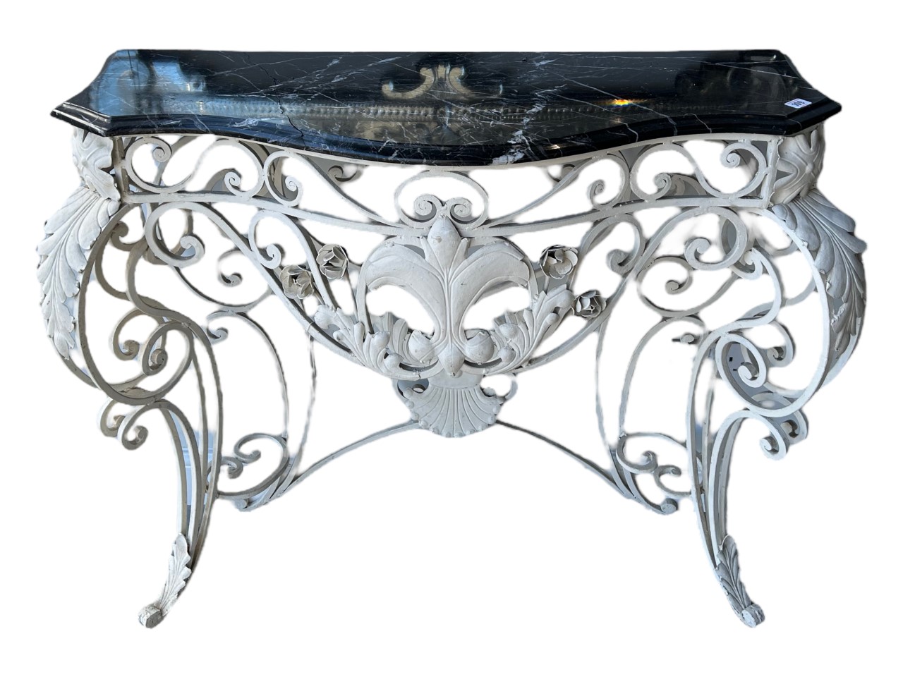 A 20TH CENTURY FRENCH PAINTED WROUGHT IRON SERPENTINE MARBLE TOP CONSOLE TABLE Decorated with