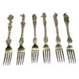 SIX 19TH CENTURY POSSIBLY EARLIER, DUTCH GILDED FORKS (FORKS TEST AS SILVER) Having different