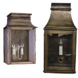 A REGENCY DESIGN SILVERED WALL LANTERN Together with another brass wall lantern, both with hinged