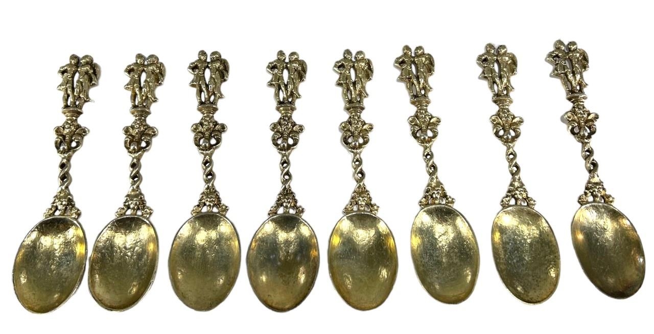 A SET OF EIGHT 19TH CENTURY POSSIBLY EARLIER DUTCH GILDED SPOONS, SPOONS TEST AS SILVER Having