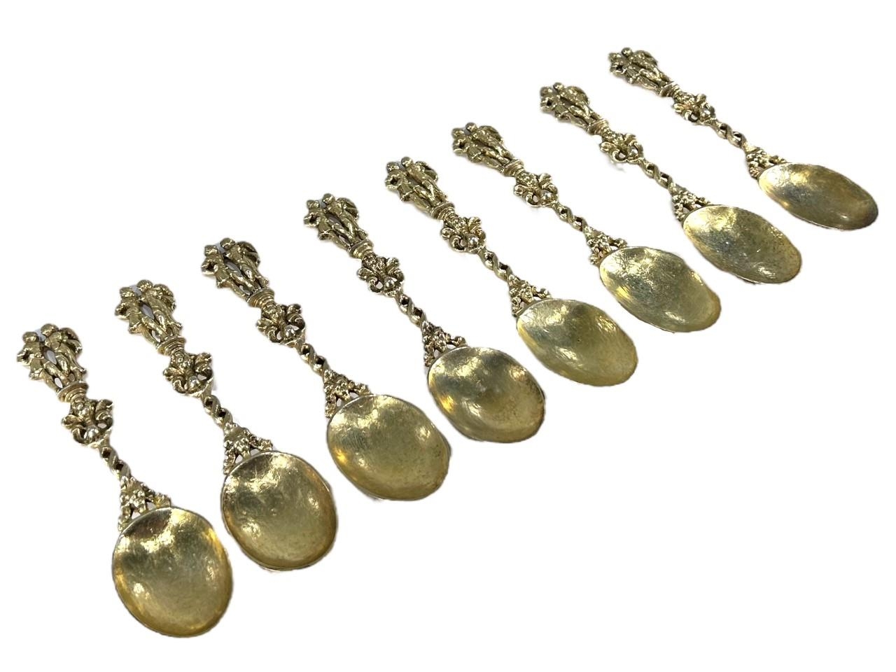 A SET OF EIGHT 19TH CENTURY POSSIBLY EARLIER DUTCH GILDED SPOONS, SPOONS TEST AS SILVER Having - Image 2 of 7