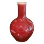A CHINESE ‘SANG-DE-BOEUF' GLAZED GLOBULAR VASE Each applied with a glaze of rich crimson red colour,