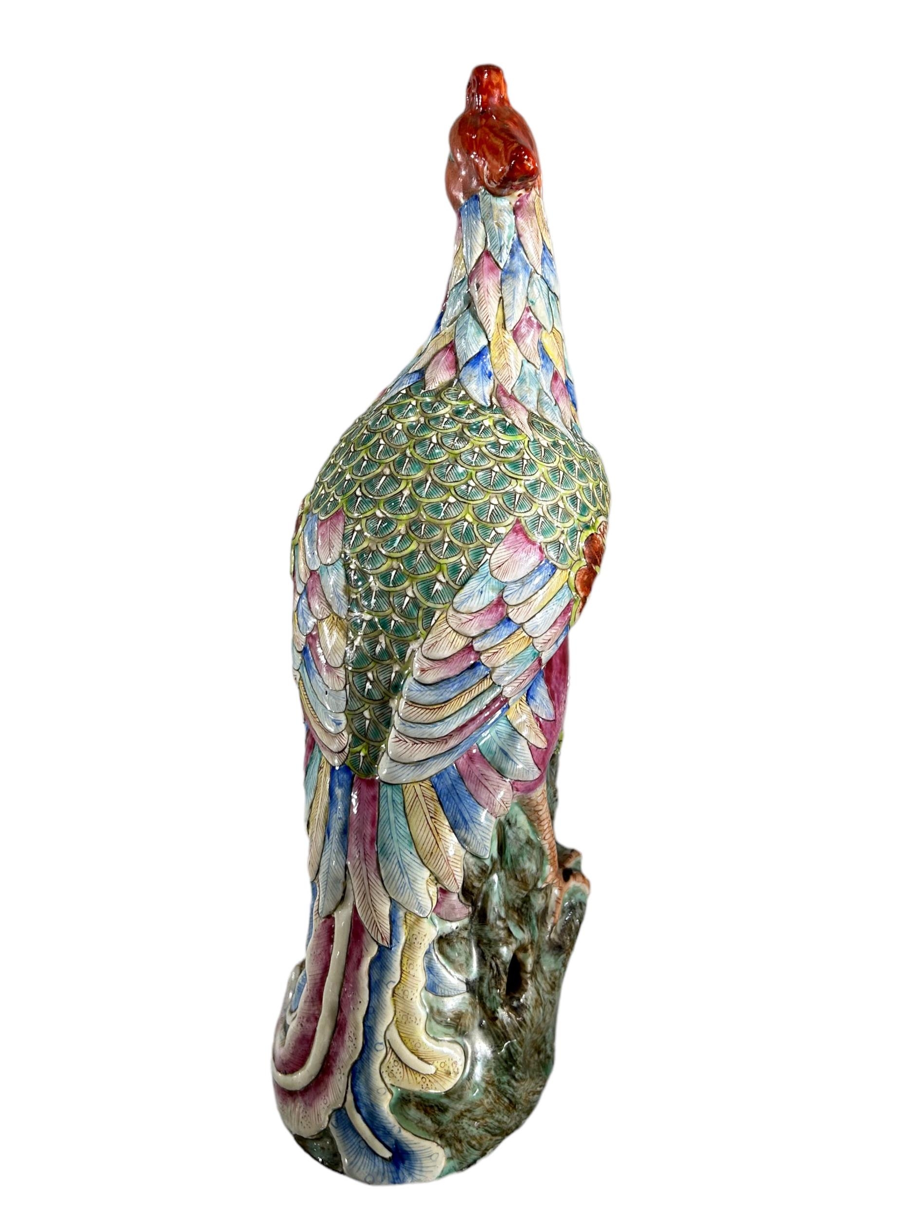 A 19TH CENTURY CHINESE FAMILLE ROSE PORCELAIN PHOENIX Decorated with flowers in a famille rose - Image 2 of 3