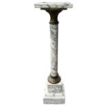 A 19TH CENTURY DESIGN GILT METAL MOUNTED MARBLE COLUMN With rotating top, raised on a plinth