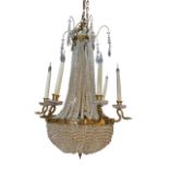 A LARGE LATE 19TH CENTURY SIX BRANCH FRENCH REGENCY DESIGN GILT ORMOLU AND GLASS BASKET CHANDELIER