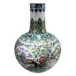 A CHINESE DOUCAI PATTERN BOTTLE VASE Decorated with four dragons chasing pearls of wisdom amongst