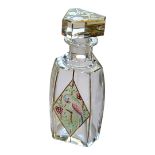 A FRENCH ART DECO CRYSTAL GLASS PARROT AND BERRIES DECANTER AND STOPPER The heavy glass body of