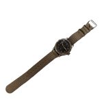 CYMA, MILITARY DIRTY DOZEN, A VINTAGE STAINLESS STEEL GENT’S WRISTWATCH Circular black dial with