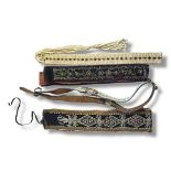 A COLLECTION OF FOUR ANTIQUE NATIVE AMERICAN INDIAN BEADWORK BELTS To include wide belt having