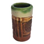 A 20TH CENTURY ART POTTERY CYLINDRICAL VASE Having a clevedon glaze interior and incised