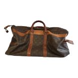 LOUIS VUITTON, PARIS, AN ORIGINAL MID 20TH CENTURY CLASSIC BROWN LEATHER LV MONOGRAM GENTLEMAN’S