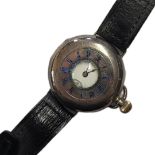 AN EARLY 20TH CENTURY SILVER DEMI HUNTER GENTS WRISTWATCH Having a glass aperture to hinged case,